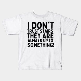 I don't trust stairs. They are always up to something. Kids T-Shirt